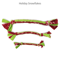 Handmade fleece dog tug toy in Holiday Snowflakes color